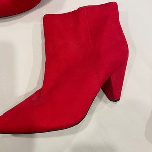 Bright red ankle boots